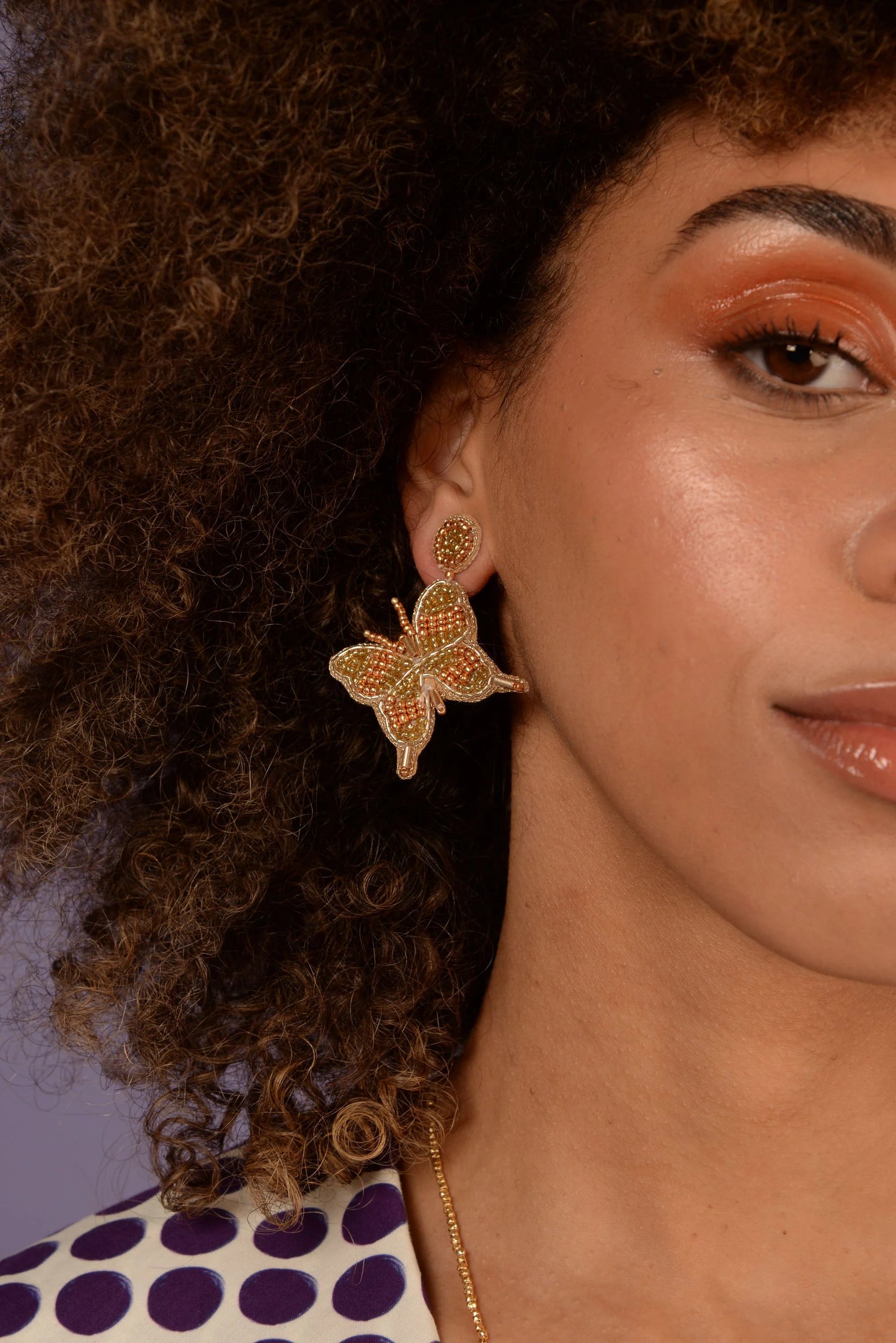 Örhängen guld fjäril