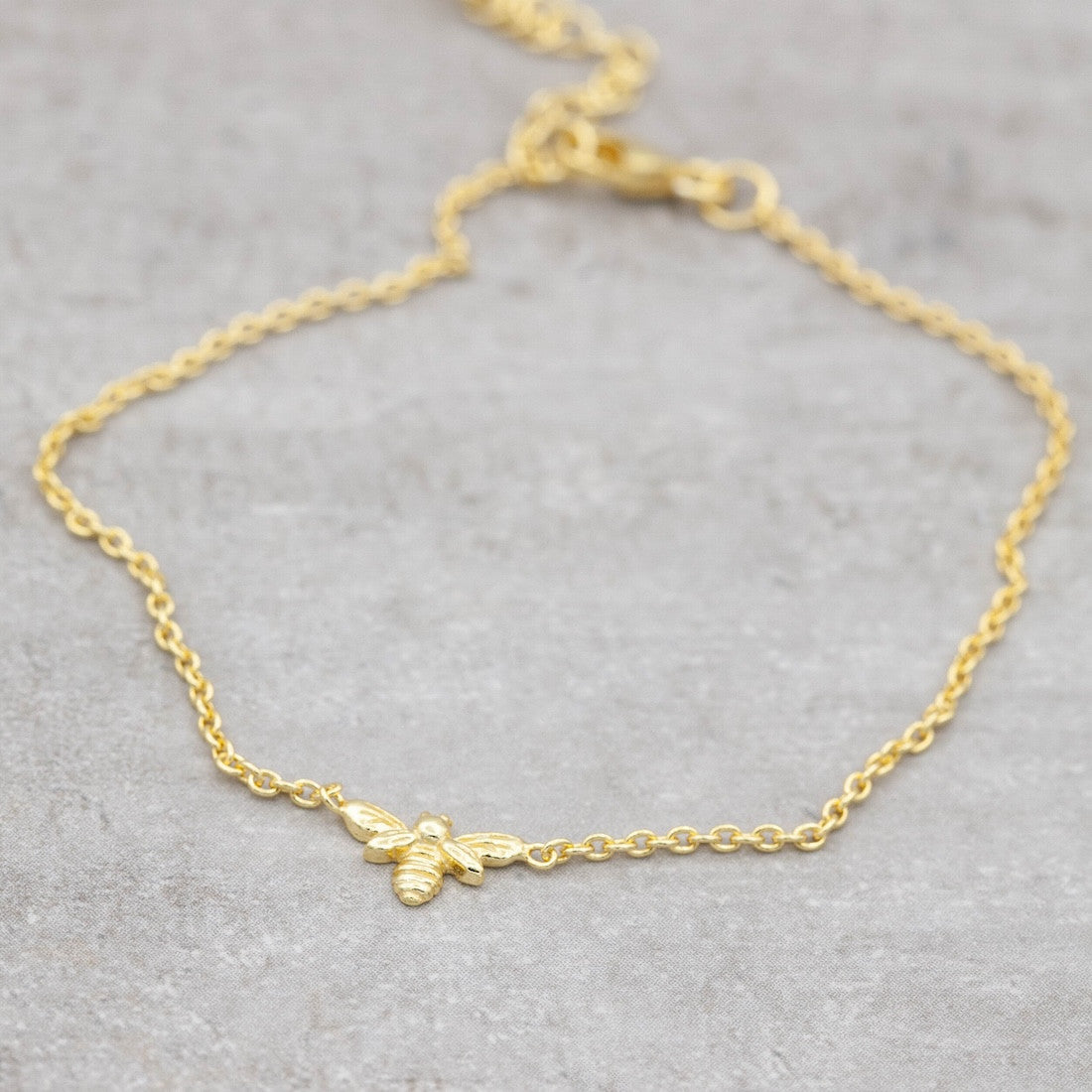 Armband i guld bee your self