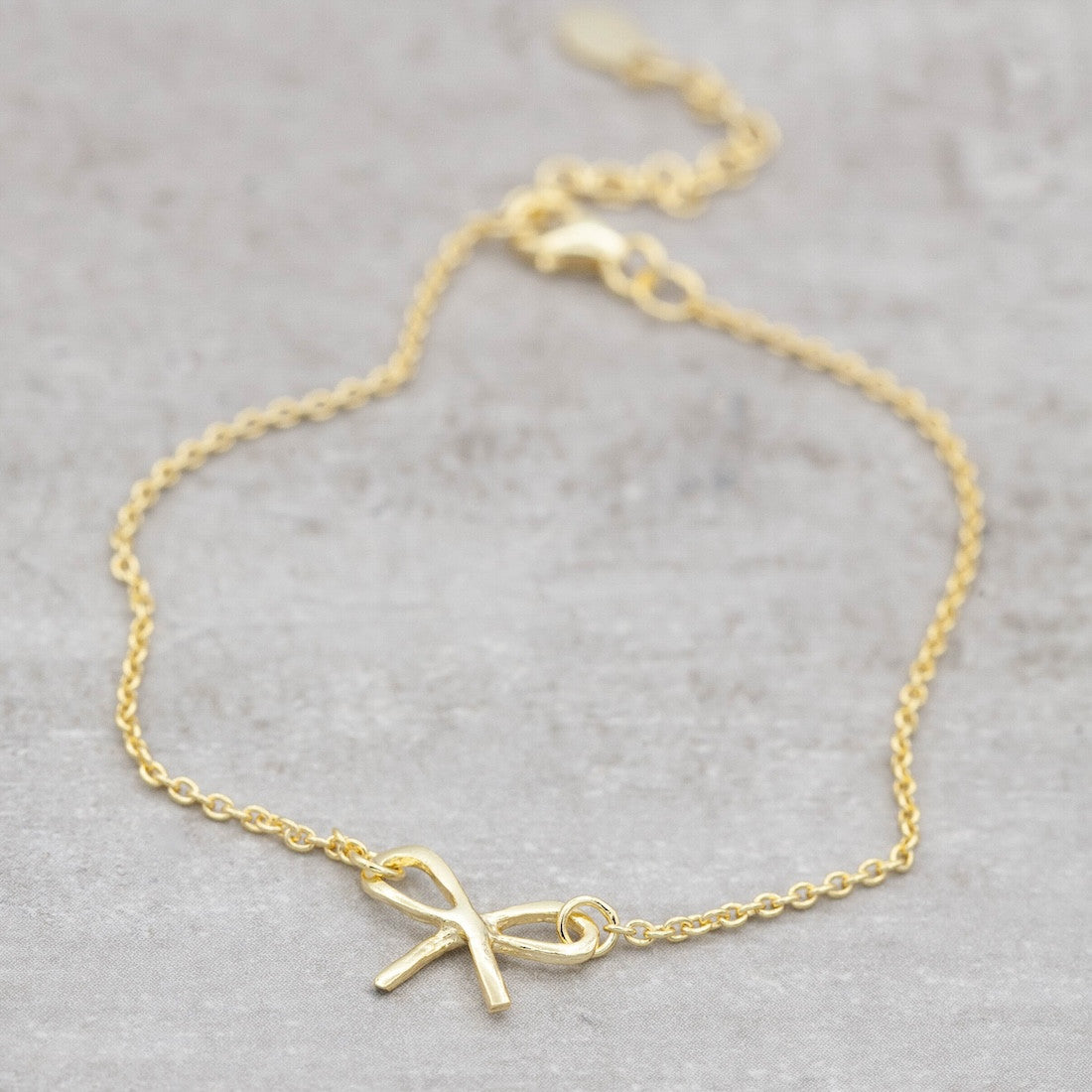 Armband i guld rosett