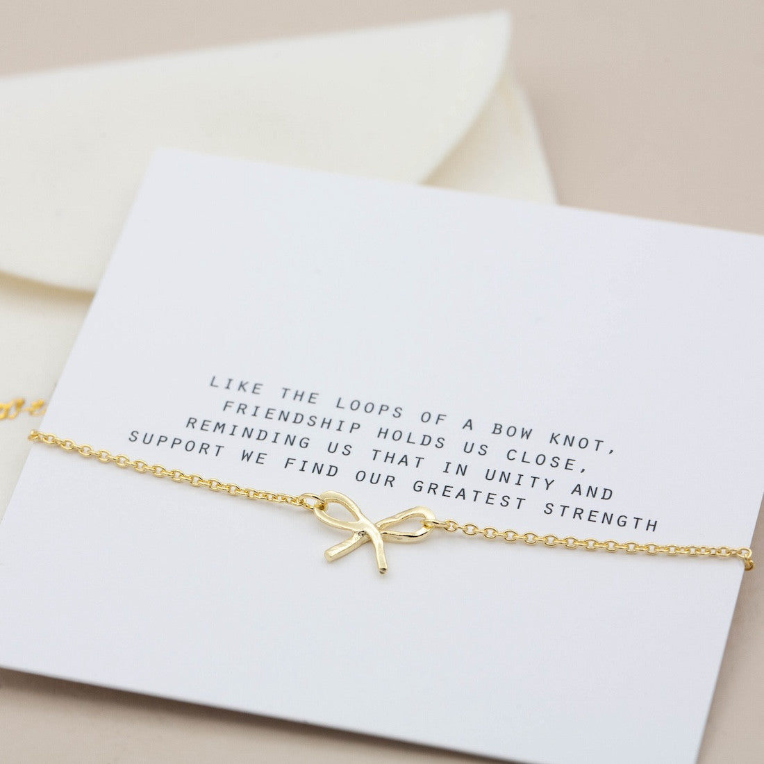 Armband i guld rosett