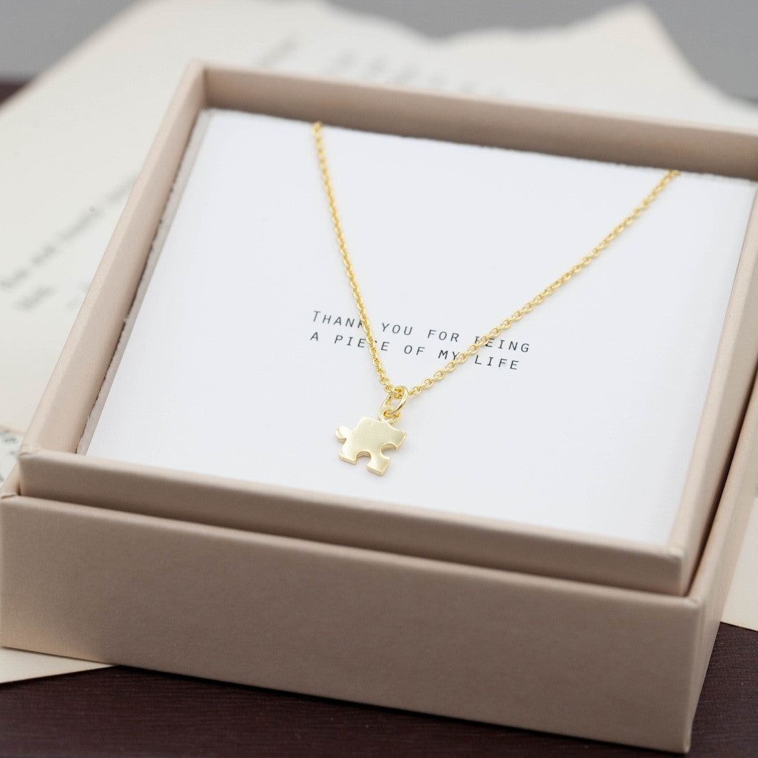 Halsband guld pusselbit