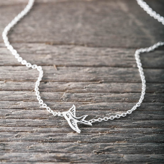 Silverhalsband svala