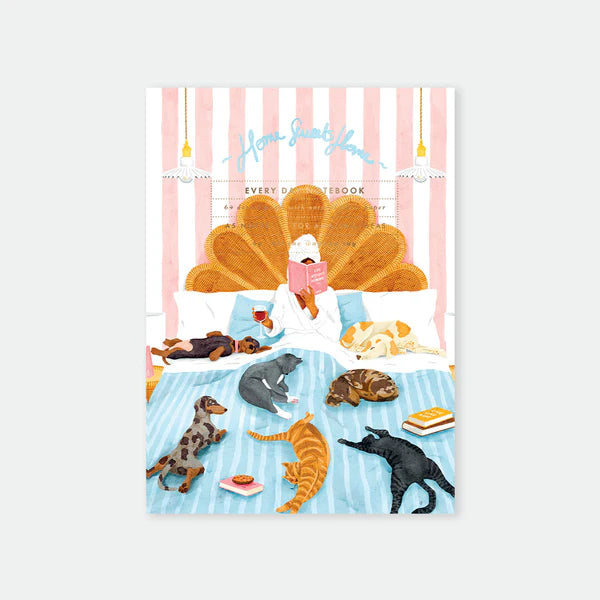 Anteckningsbok hundar och katter i säng