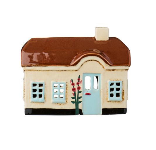 Danska värmeljushus stockrosor ljusblå dörr