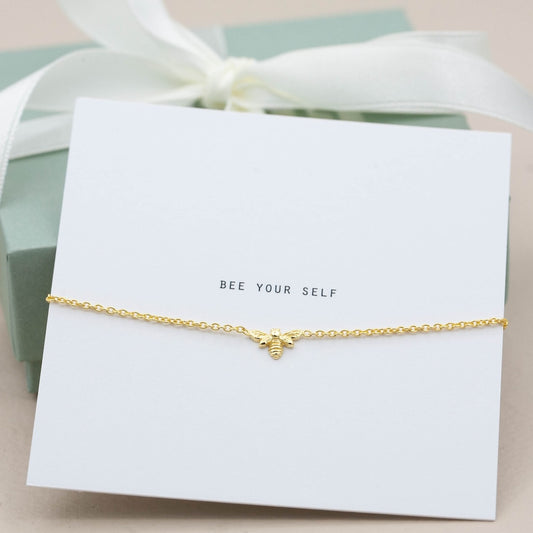 Armband i guld bee your self