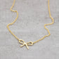 Halsband i guld rosett