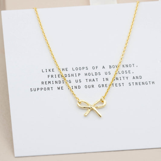 Halsband i guld rosett